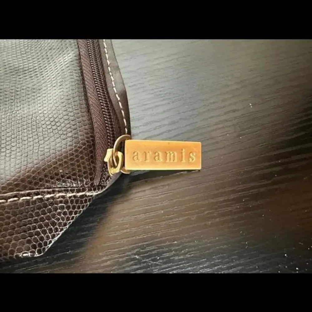 Aramis Brown Mesh Cosmetic Bag with Zipper Closure